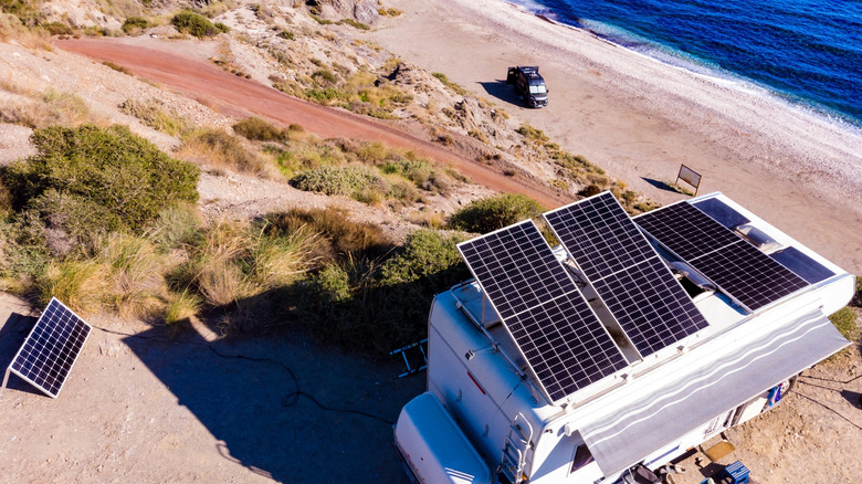 aerial view of camper rv with tilt solar panels.